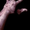 "Severed Silicone Arm With Magnetic Thumb" Bloody Body Part Halloween Prop